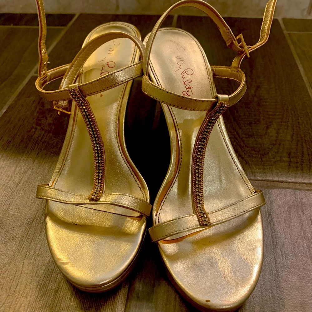 Lilly Pulitzer wedges , used condition see wear . Unnoticeable when worn !